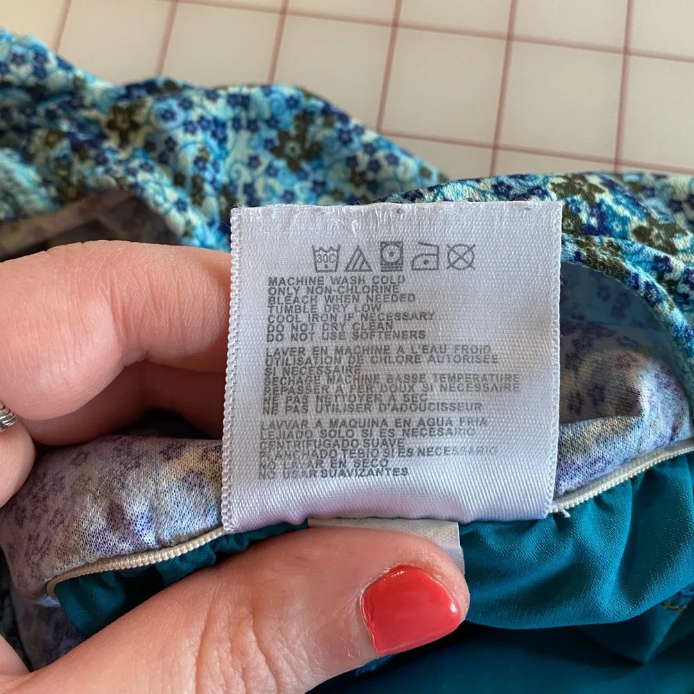 New Balance women’s turquoise blue floral athletic running shorts size medium